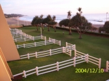 Sea, breakers and beach viewed from the main bedroom balcony (North)